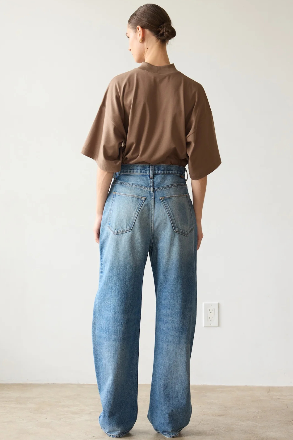 Model wearing Jamie Haller The Fan Jean rear view