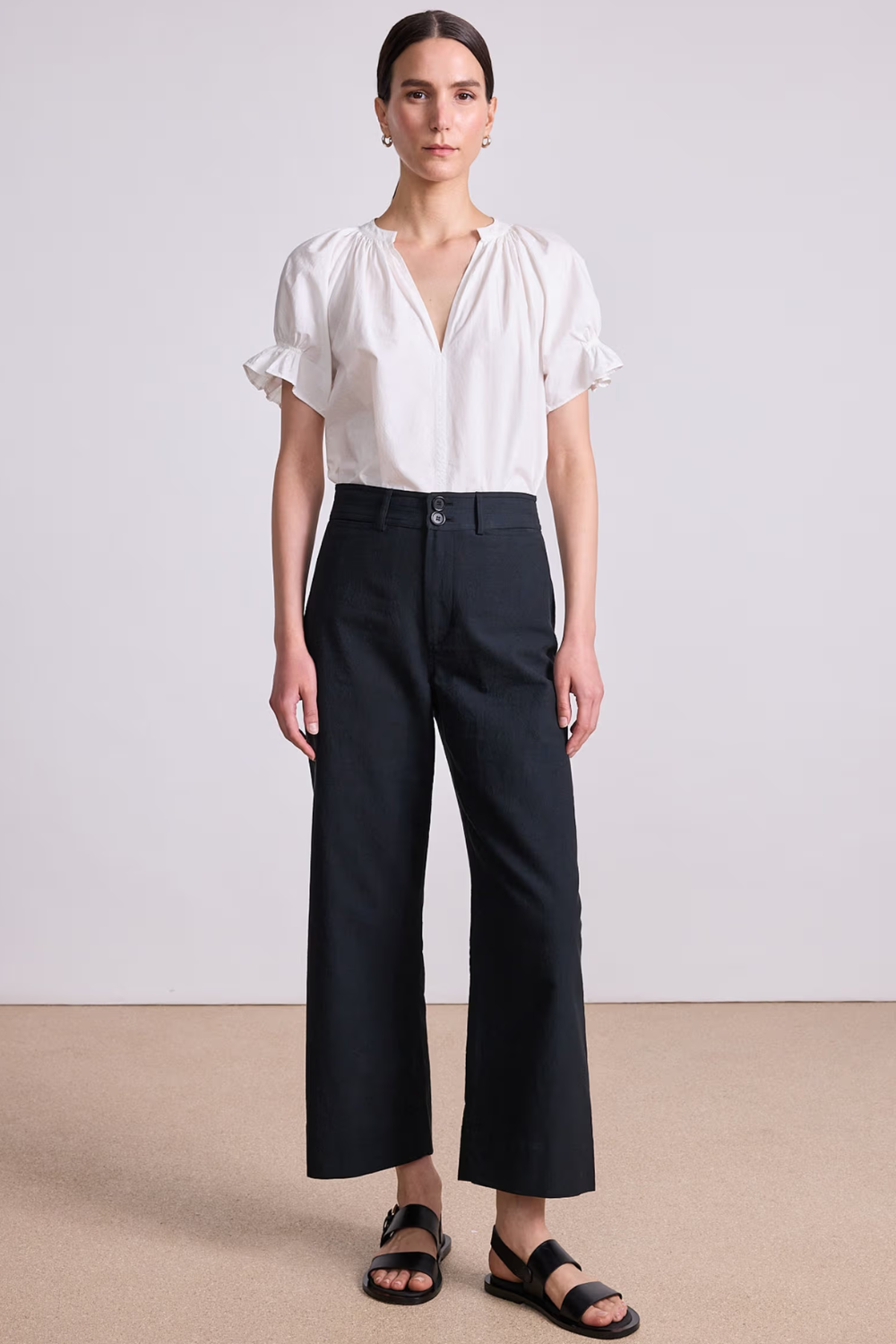 Model wearing Apiece Apart Classic Merida Pant front view