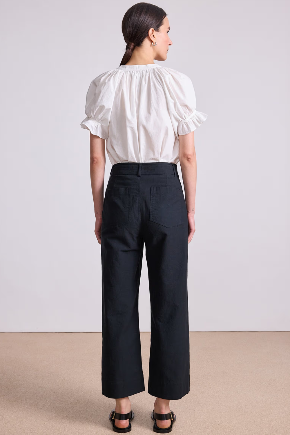 Model wearing Apiece Apart Classic Merida Pant rear view