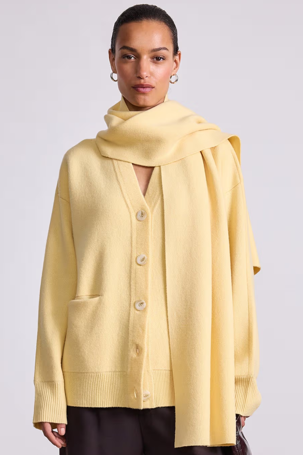 Model wearing Apiece Apart Medina Cardigan With Scarf front 