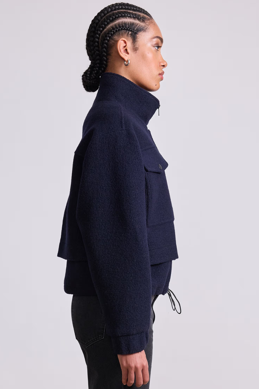 Model wearing Apiece Apart Selva Cropped Bomber rear view