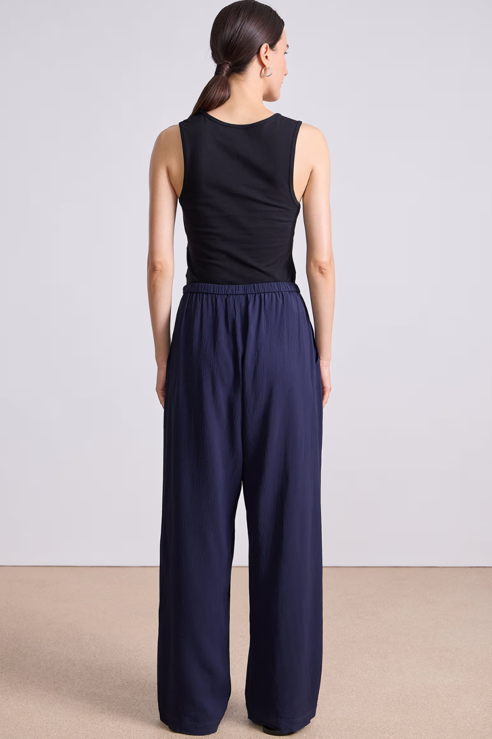 Model wearing Apiece Apart Kari Pull On Pant rear view