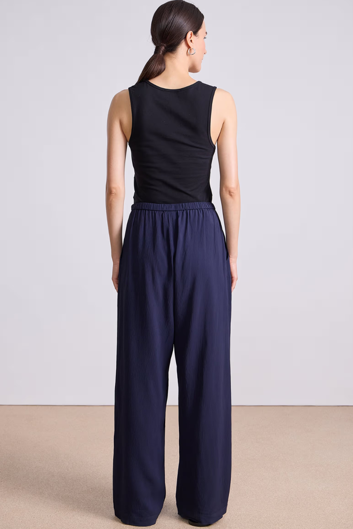 Model wearing Apiece Apart Kari Pull On Pant rear view