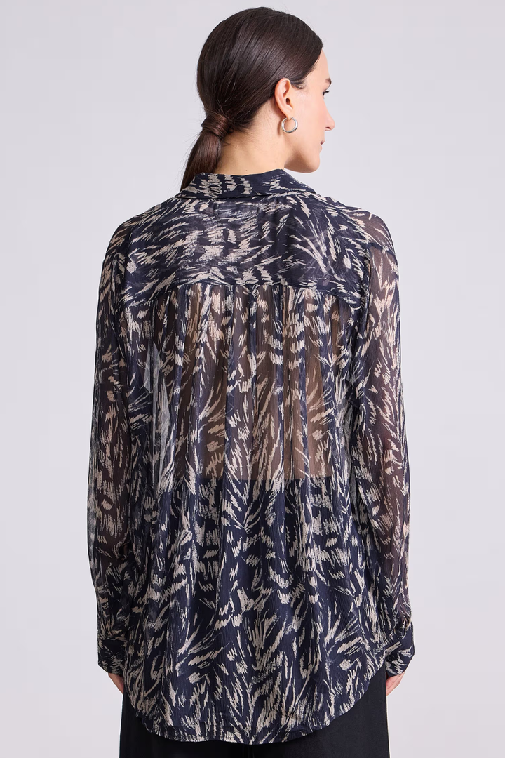 Model wearing Apiece Apart Alva Button Up rear view