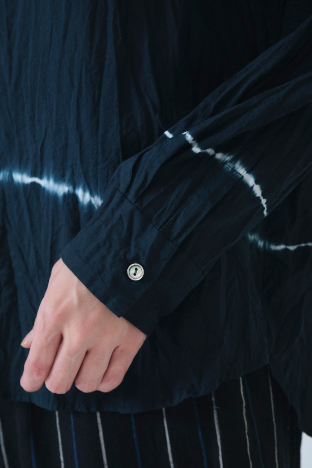 Model wearing Pas de Calais Soft Voile Crinkle Yarn Dye Blouse front/detail  view