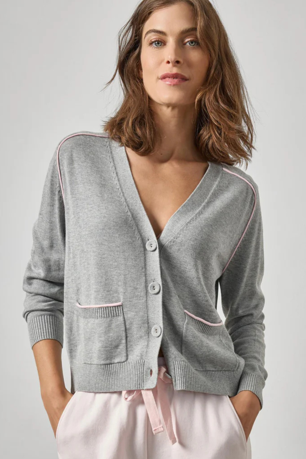 Model wearing Lilla P Saddle Sleeve V Neck Cardigan front view