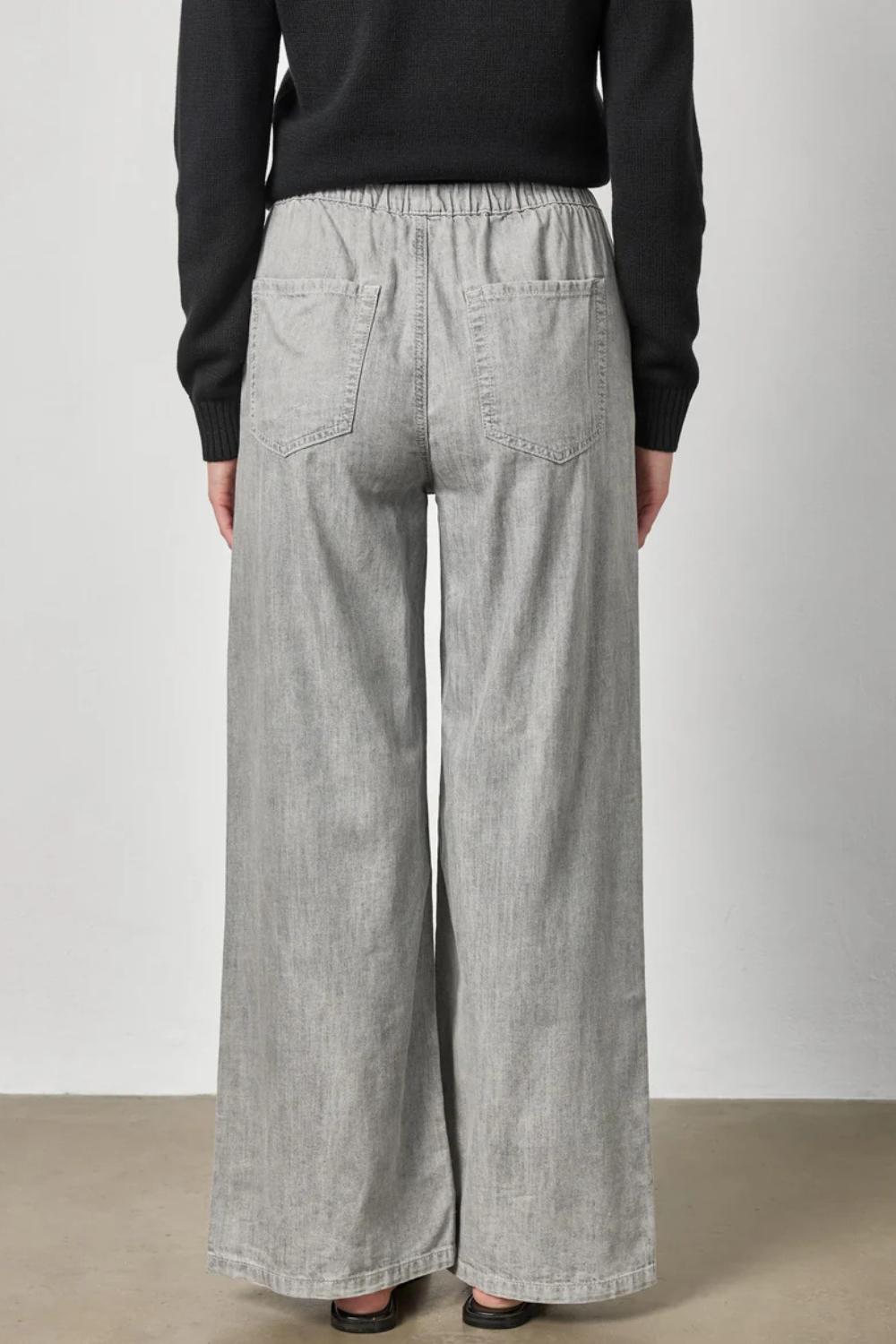 Model wearing Lilla P Denim Pant rear view