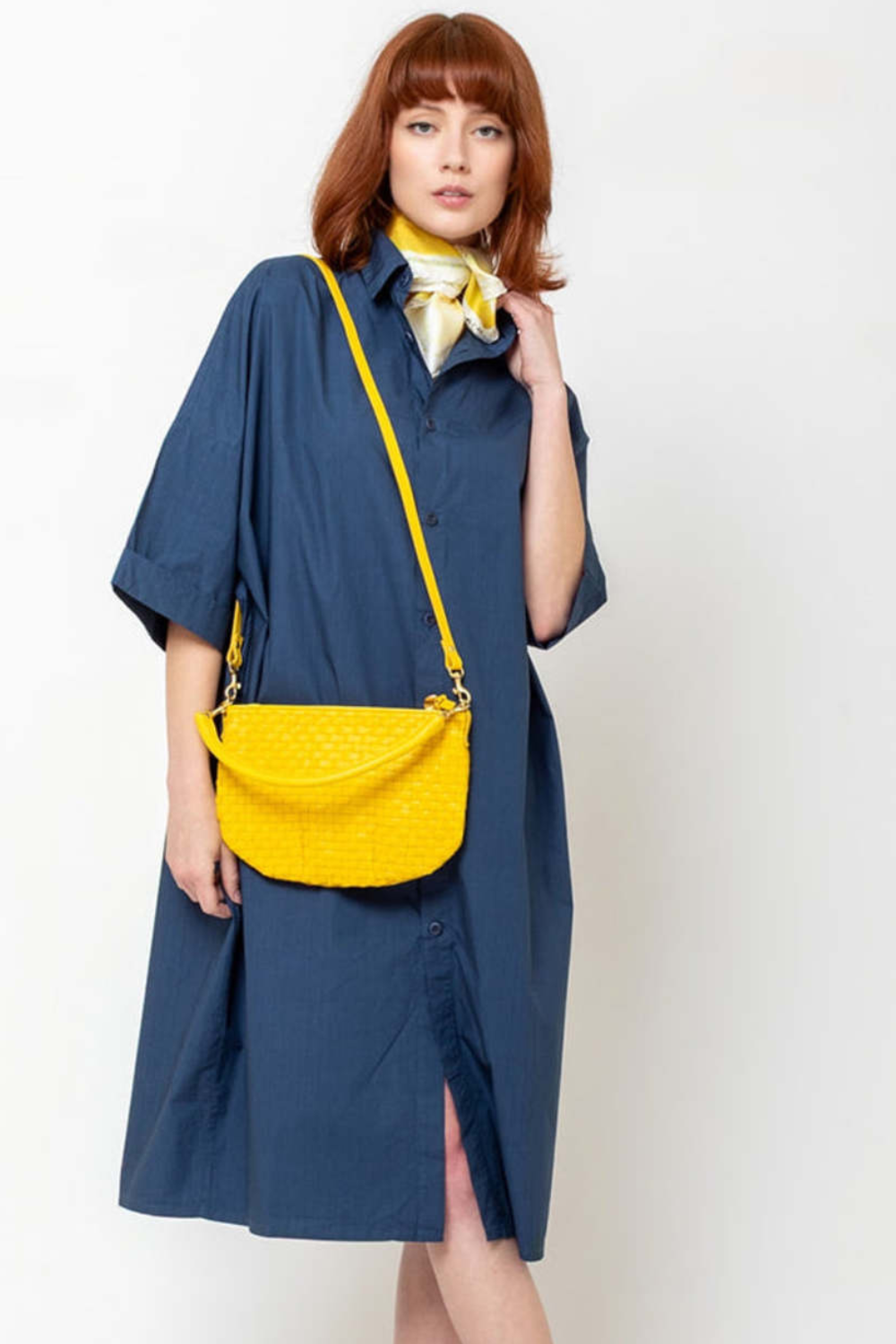 Model wearing Clare V. Petit Moyen Messenger front view