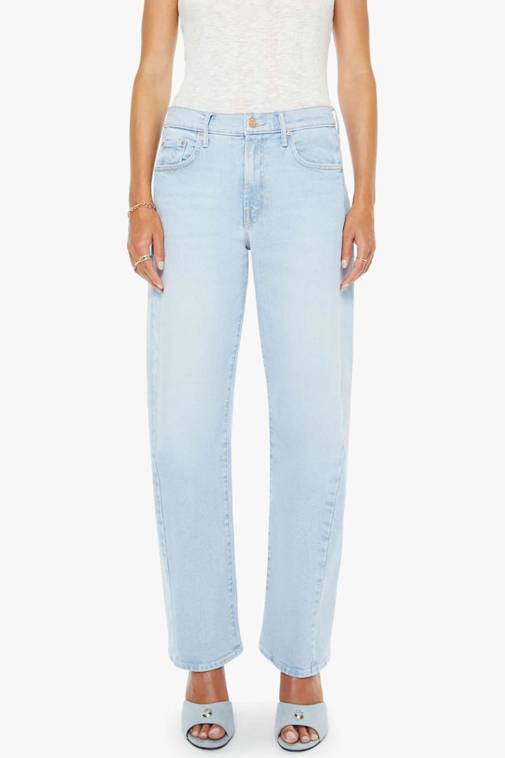 Model wearing Mother Denim The Mid Rise Half Pipe Hover front view