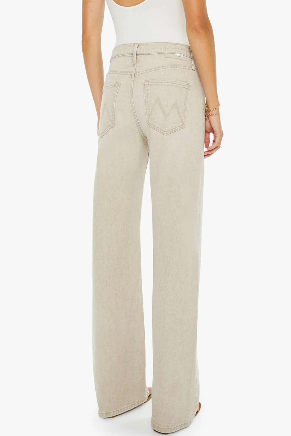 Model wearing Mother Denim The Dodger Sneak rear view