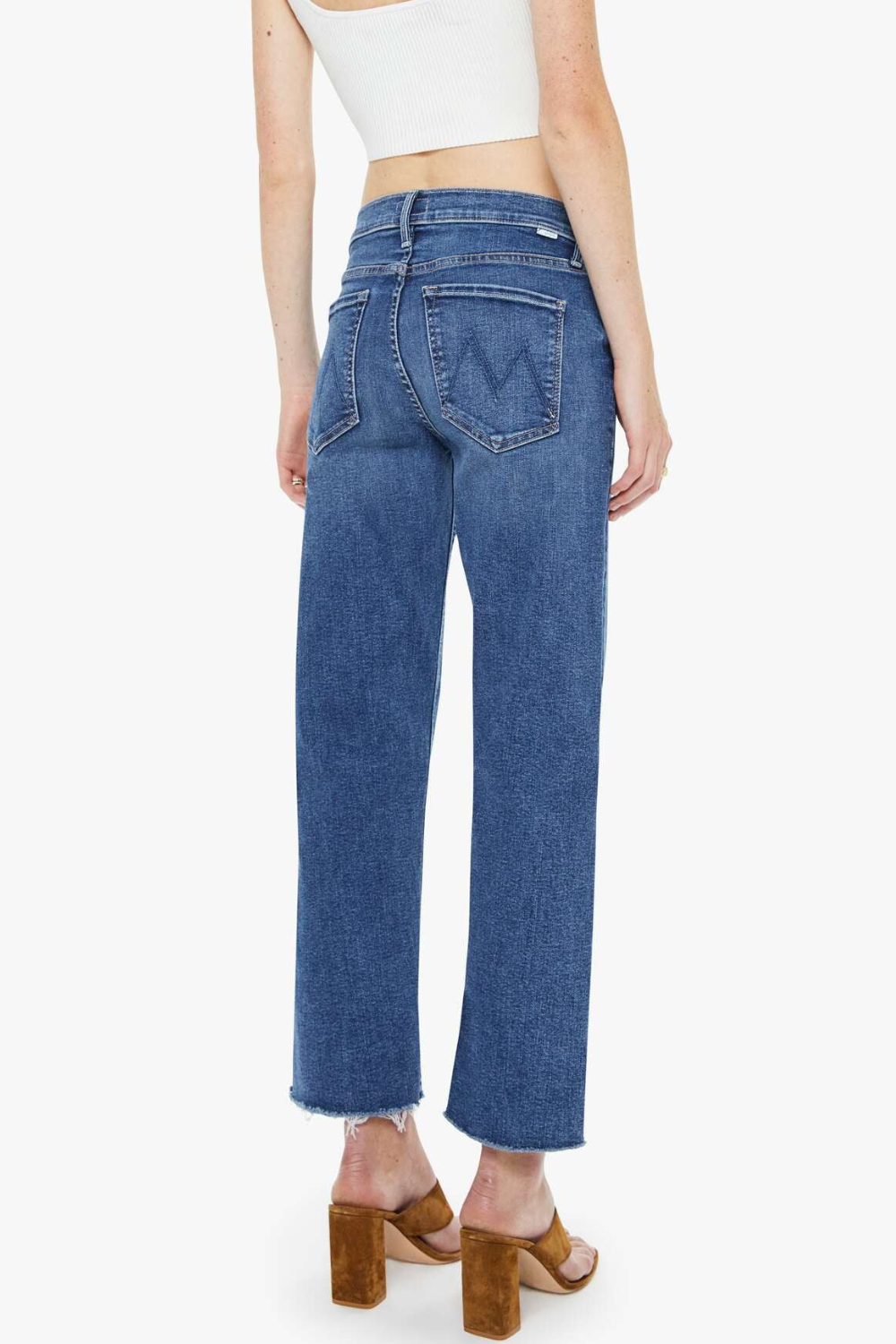 Model wearing Mother Denim The Newbie Ankle Fray rear view