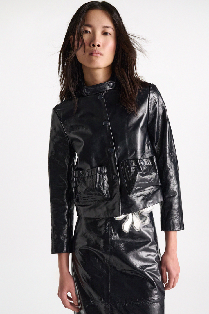 Model wearing Dorothee Schumacher Sleek Shine Jacket front view