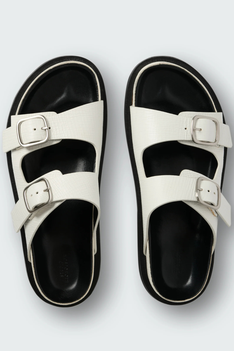 Flat lay of Studio Nicolson Denver Palmellato Leather 2 Strap Sandal top view