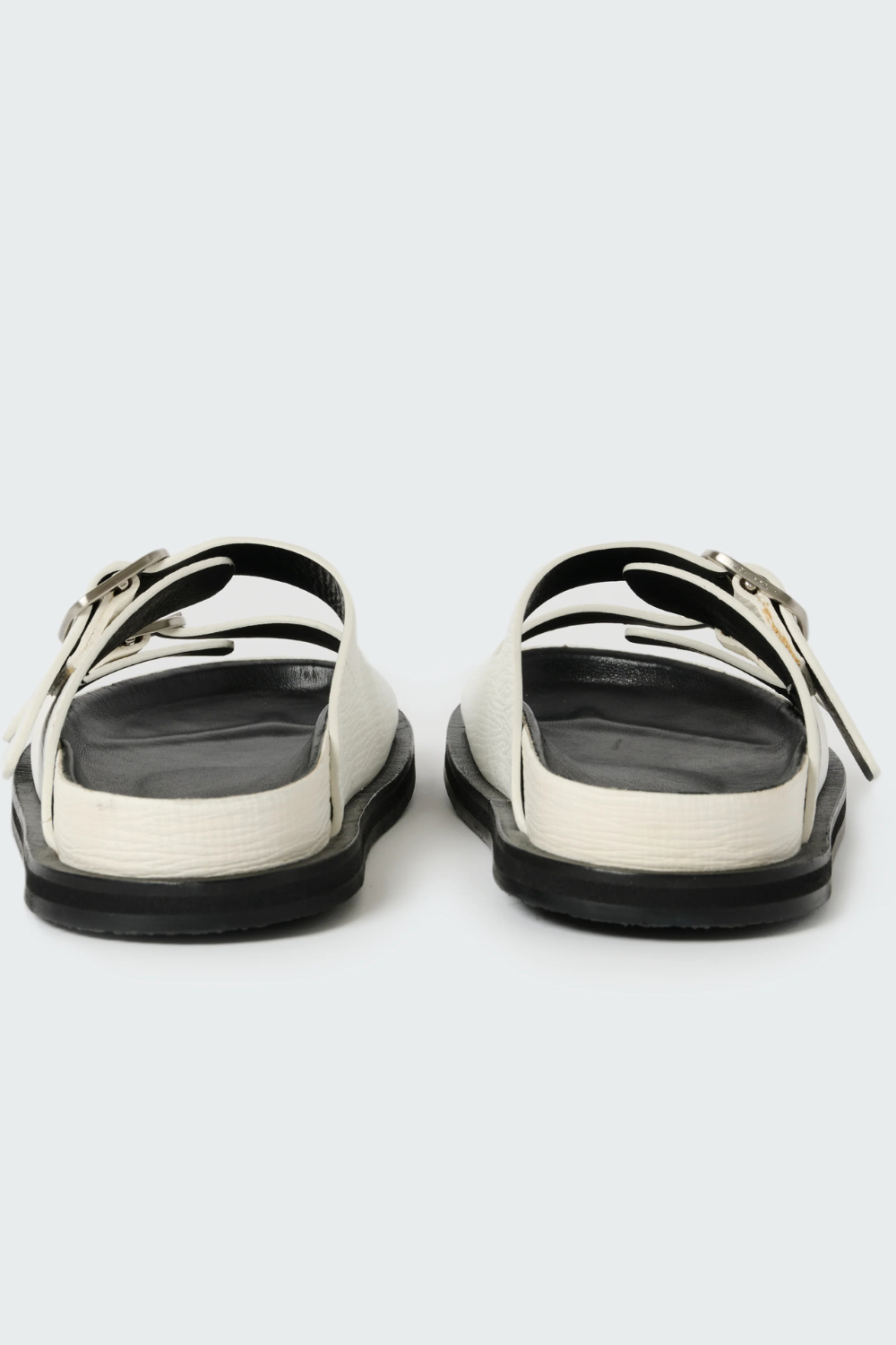 Flat lay of Studio Nicolson Denver Palmellato Leather 2 Strap Sandal rear view