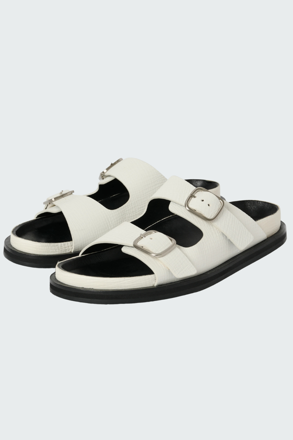 Flat lay of Studio Nicolson Denver Palmellato Leather 2 Strap Sandal side/front view