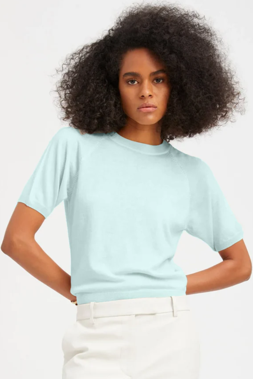 Model wearing SPRWMN Short Sleeve Raglan Tee Shirt Ice front view