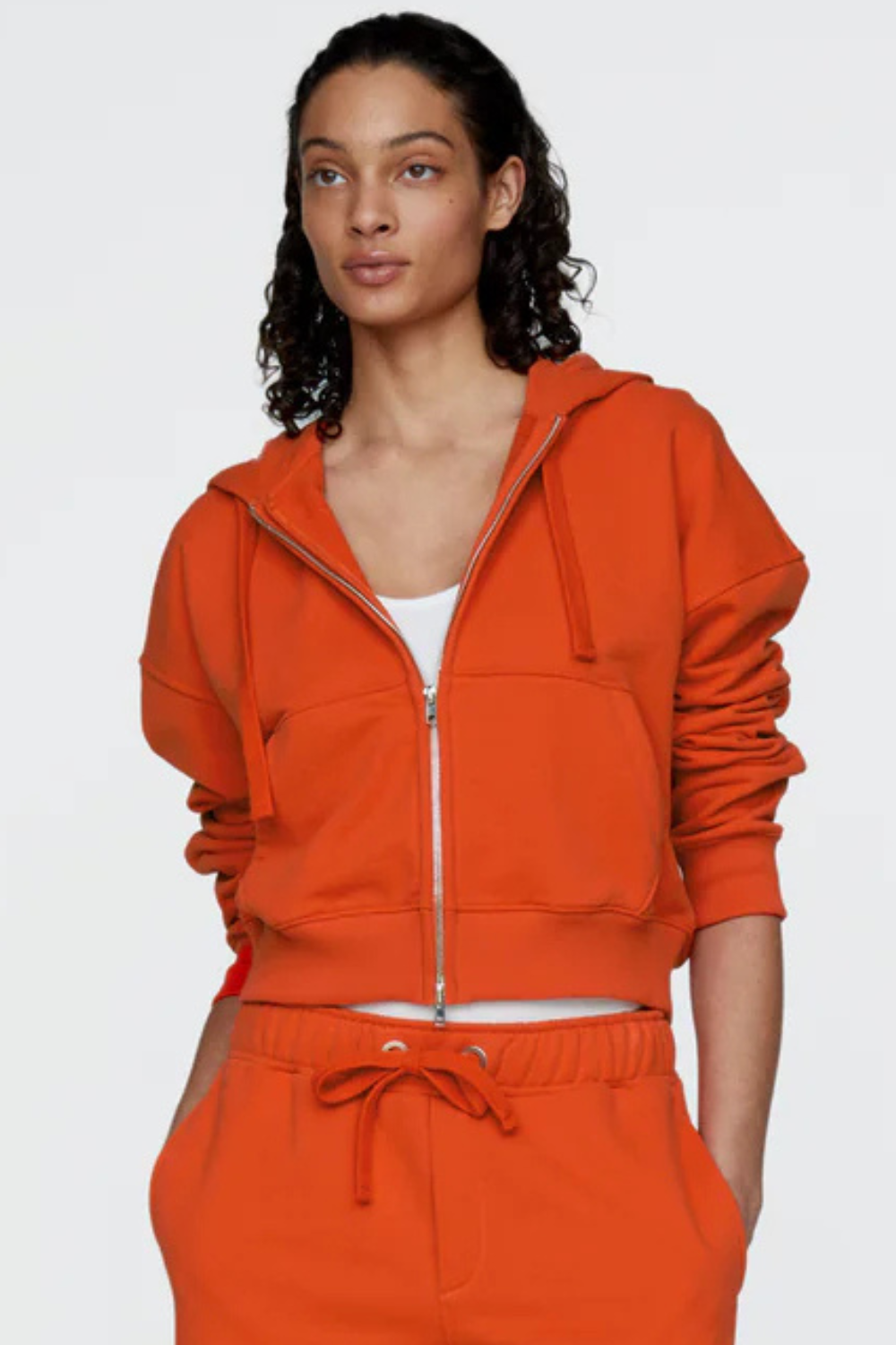 Model wearing ATM Anthony Thomas Melillo Cotton Cropped Zip Up Zip Down Hooded Sweatshirt front view
