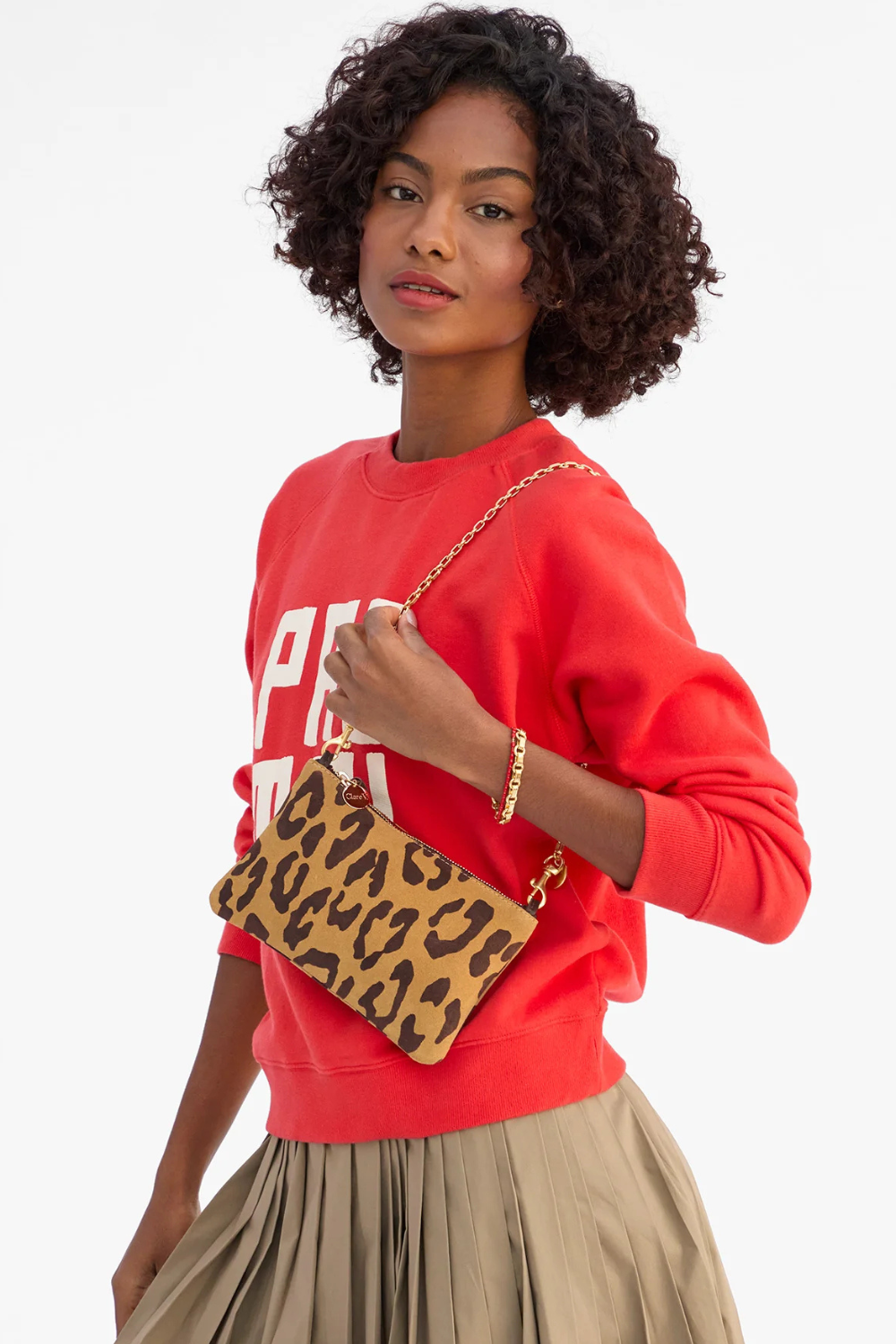 Model wearing Clare V. Wallet Clutch w/ Tabs front view