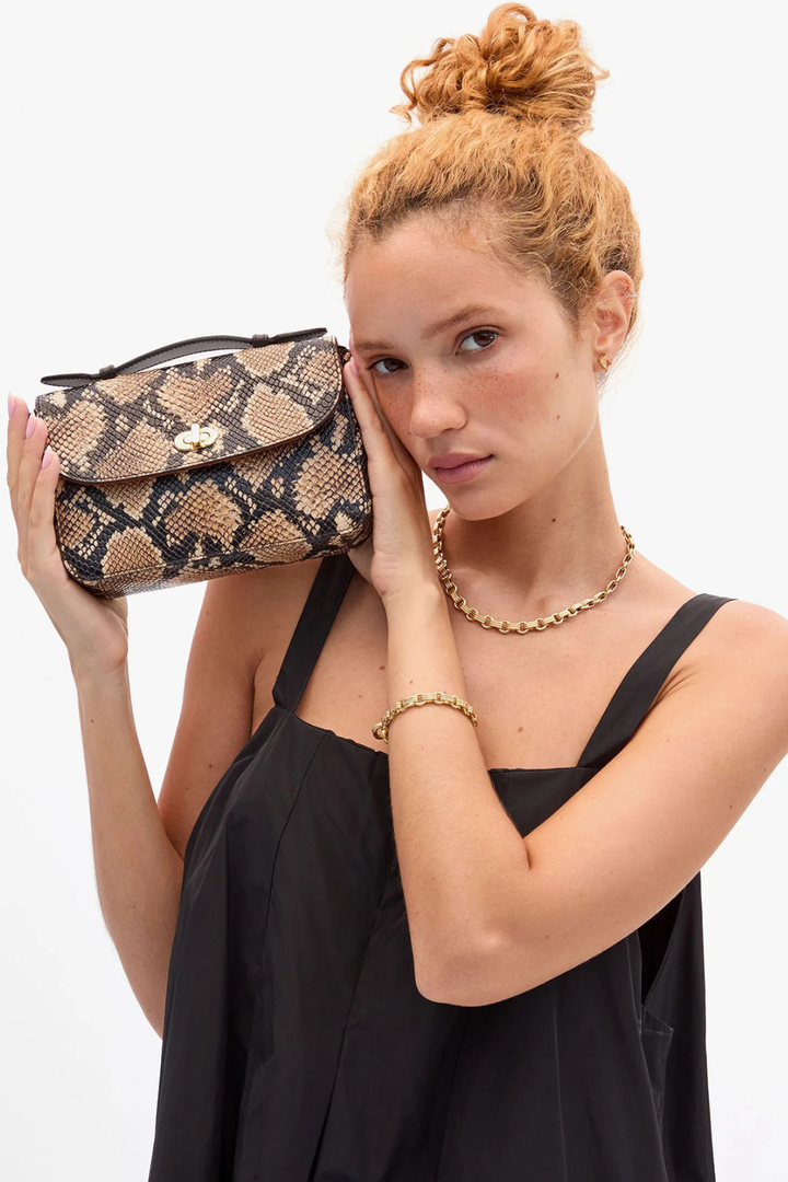 Model holding Clare V. Kathryn Bag front view