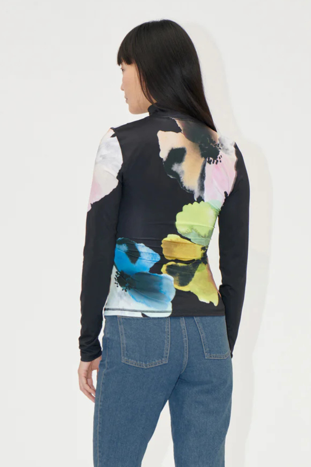 Model wearing Stine Goya Elastic High Neck Collared Top rear view