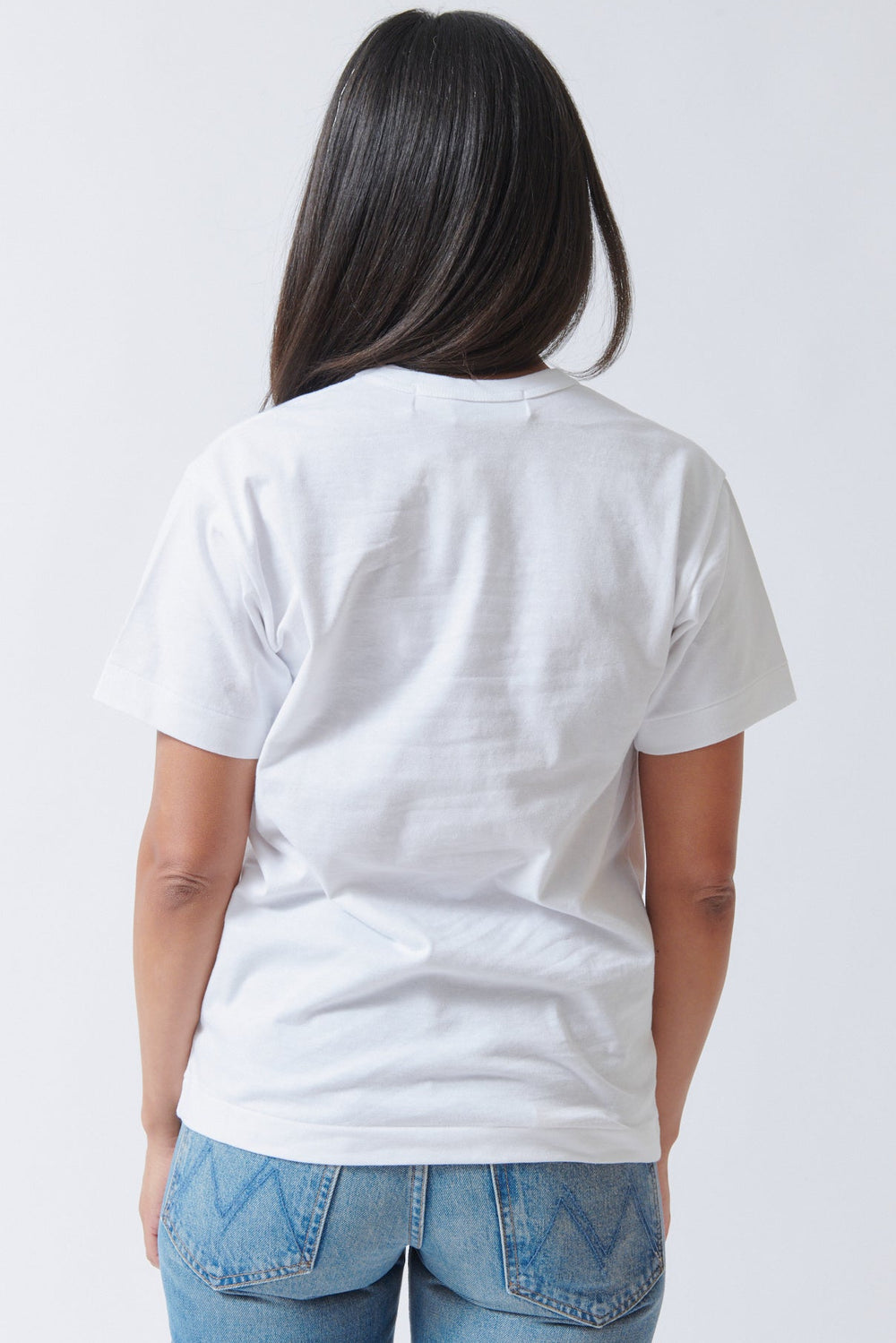 Amanda wearing Comme des Garçons PLAY Black Emblem T Shirt White Black Heart rear view