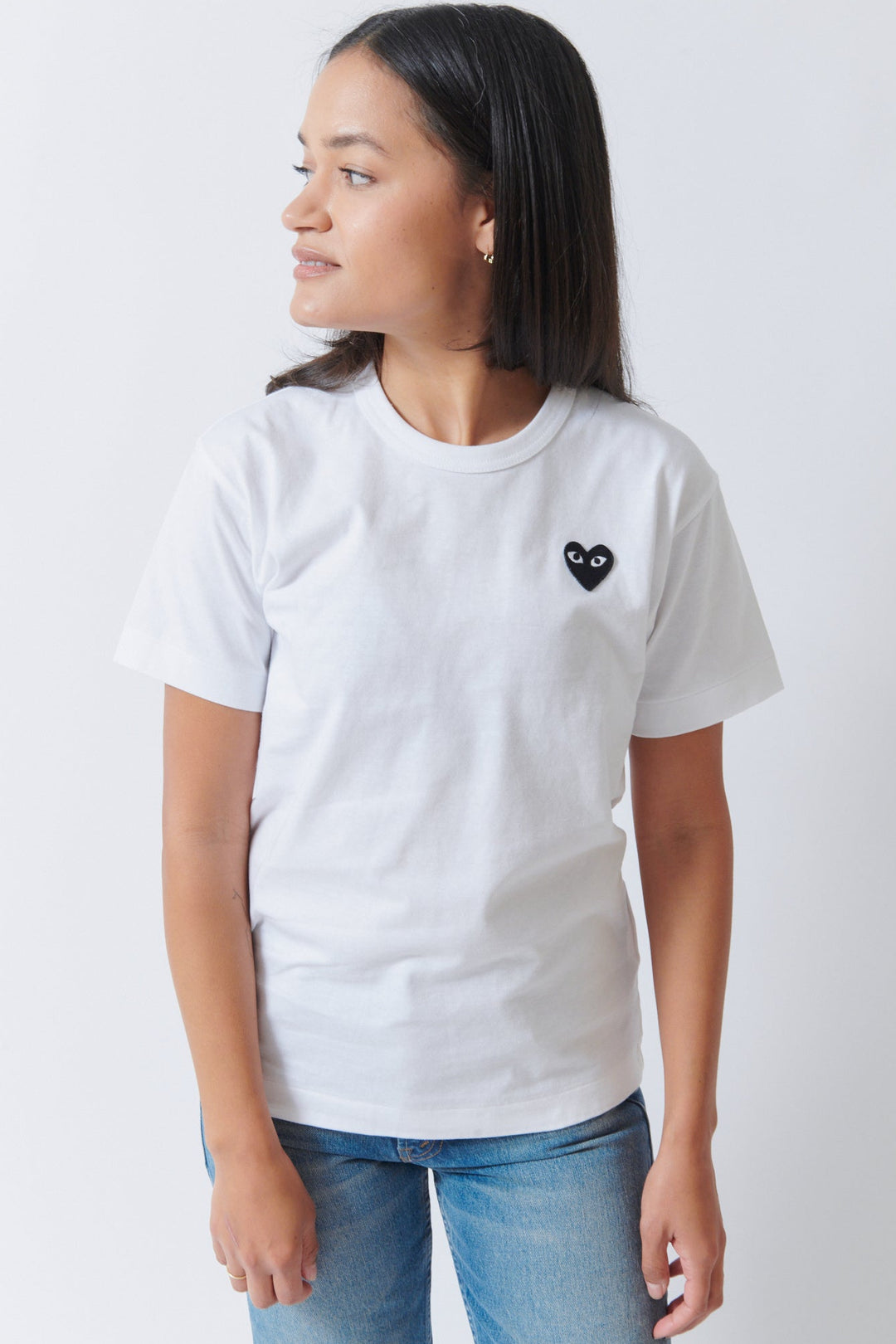 Amanda wearing Comme des Garçons PLAY Black Emblem T Shirt White Black Heart front view