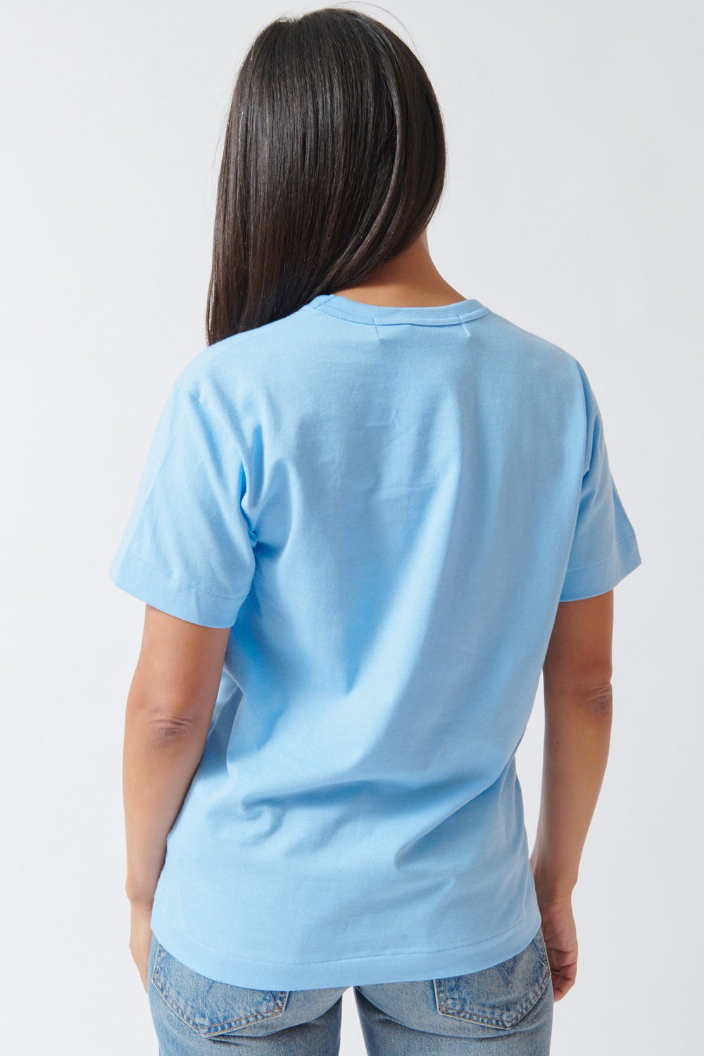 Amanda wearing Comme des Garçons PLAY Logo Print T Shirt Blue rear view