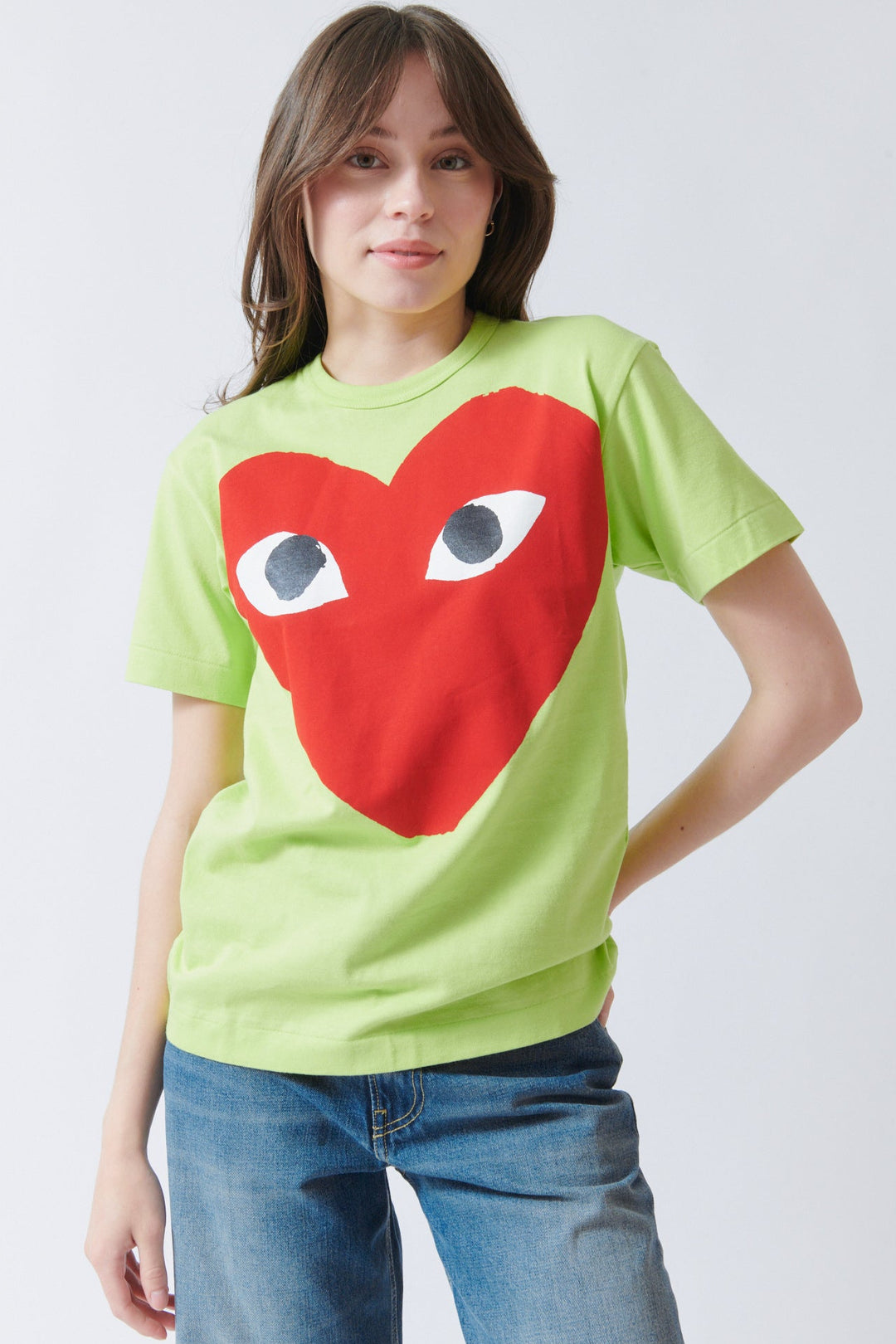 Angela wearing Comme des Garçons PLAY Logo Print T Shirt front view