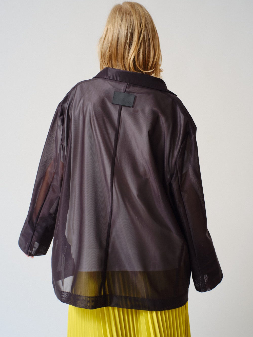 Madi wearing COG The Big Smoke Jubilee Jacket rear view