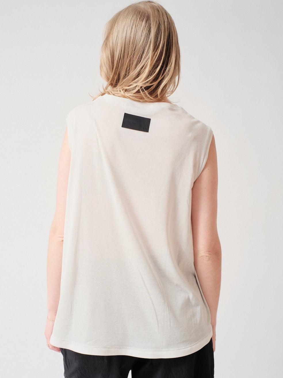 Madi wearing COG The Big Smoke Nelly Sleeveless Top rear view