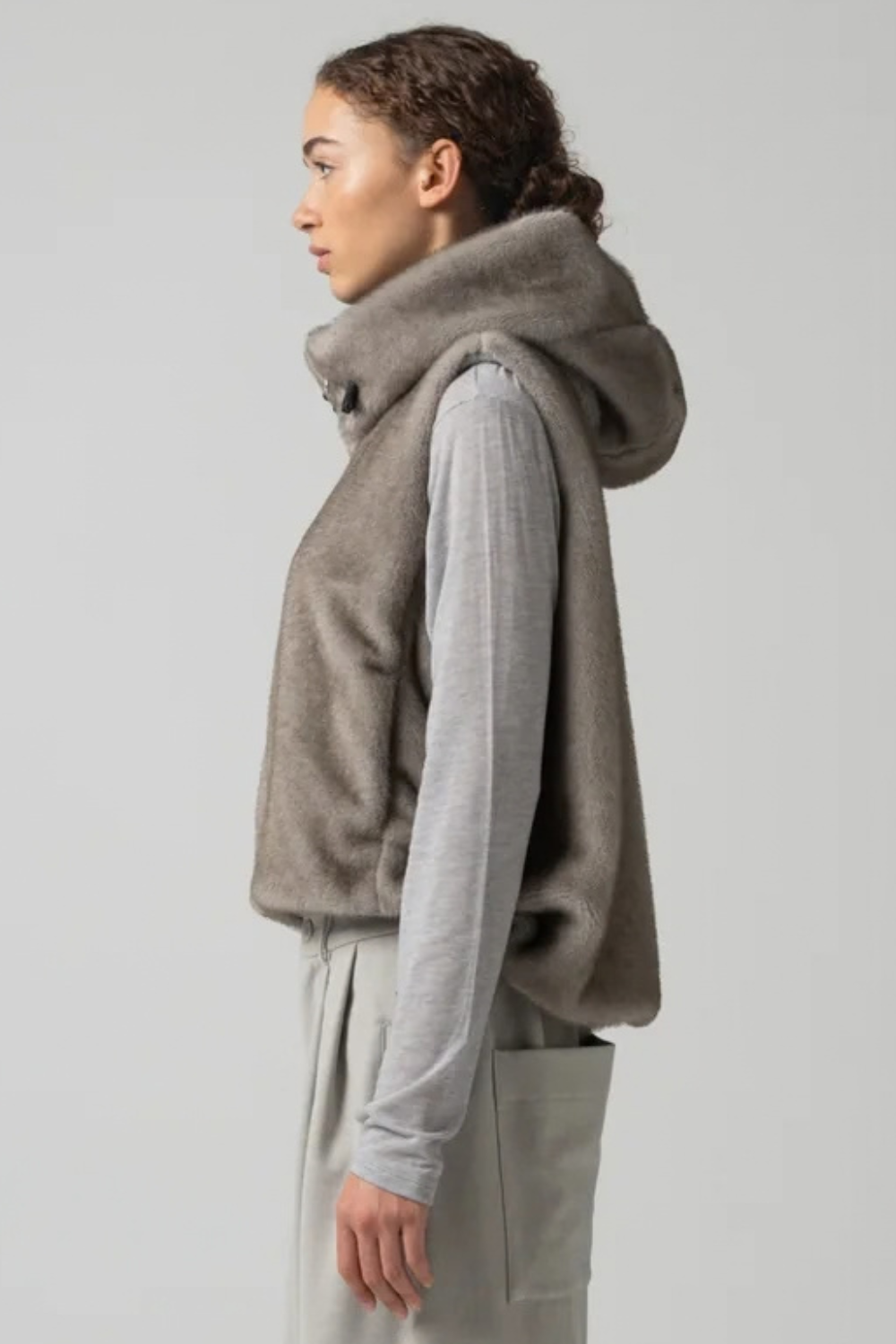 Model wearing COG The Big Smoke Orah Hoody Cropped Vest side view