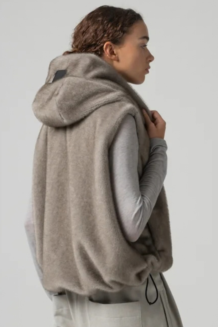 Model wearing COG The Big Smoke Orah Hoody Cropped Vest rear view