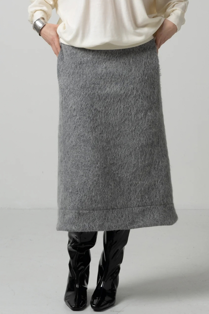 Model wearing COG The Big Smoke Octavia A-Line Skirt front /detail view
