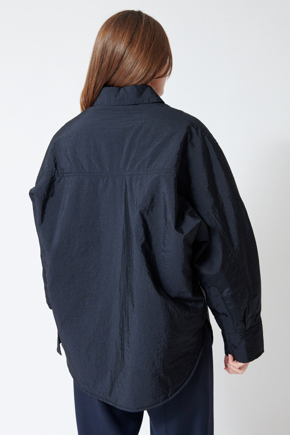 Julia wearing Christian Wijnants Toka Shirt Jacket in Navy, rear view.