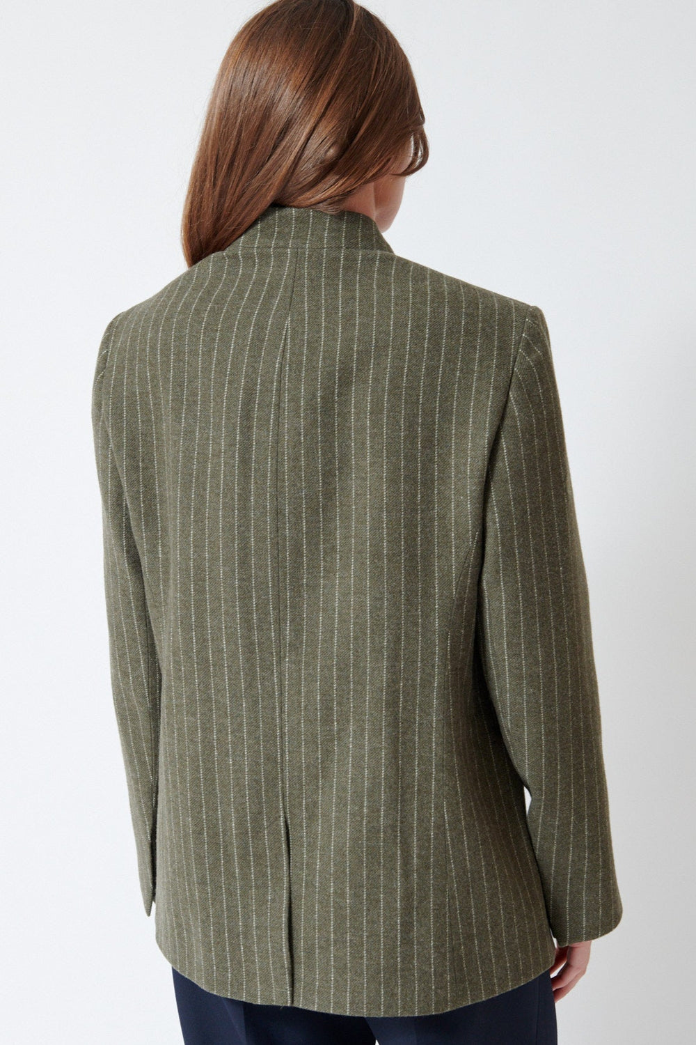 Julia wearing Christian Wijnants Jorolo Jacket in Khaki Stripe, rear view.