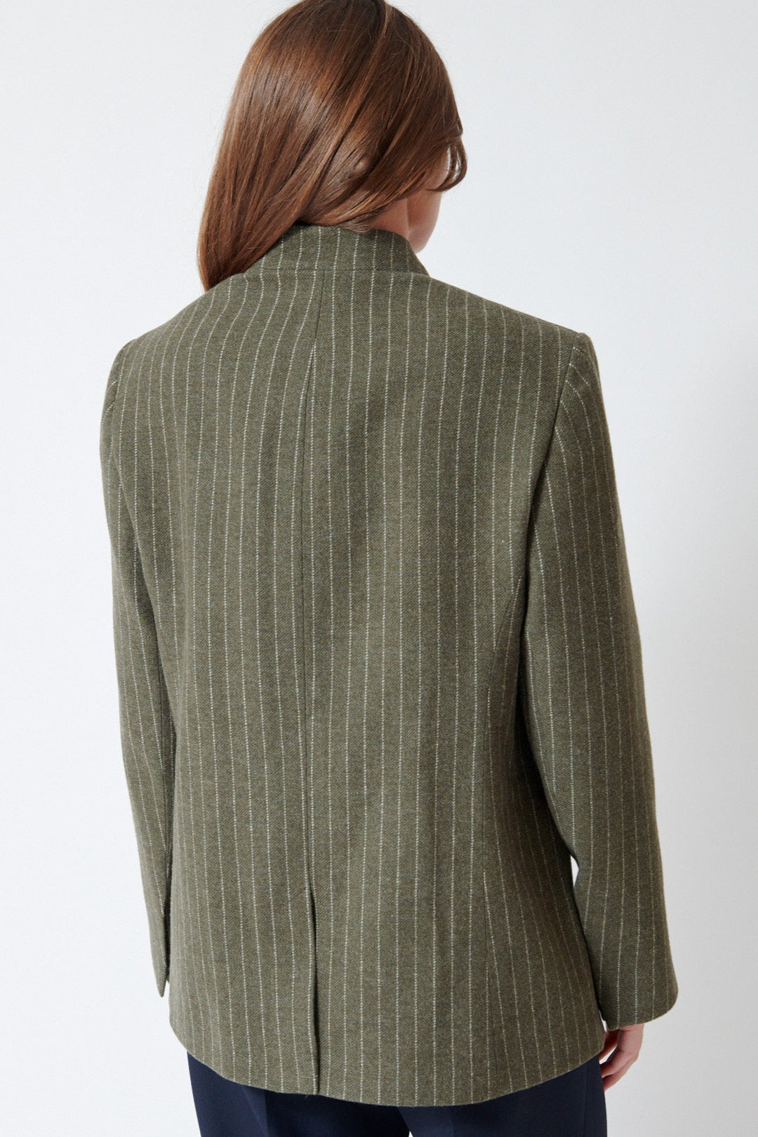 Julia wearing Christian Wijnants Jorolo Jacket in Khaki Stripe, rear view.