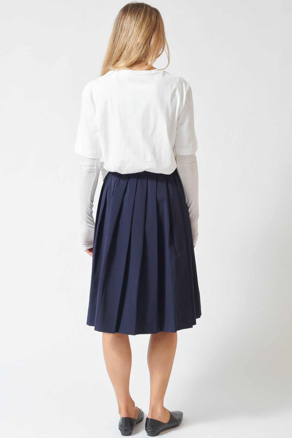Mari wearing ELEH Drawstring Pleat Skirt rear view