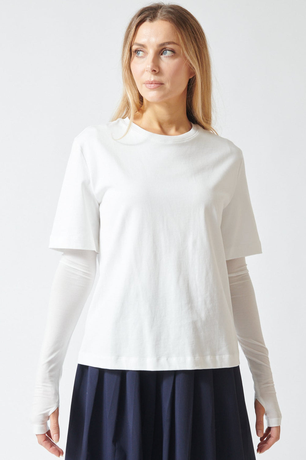 Mari wearing ELEH Long Short Layered Thumb Tee front view