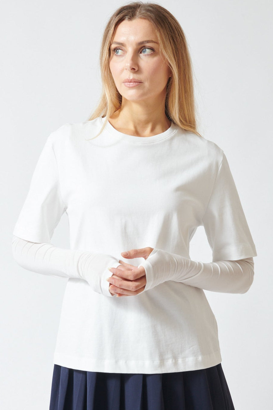 Mari wearing ELEH Long Short Layered Thumb Tee front view