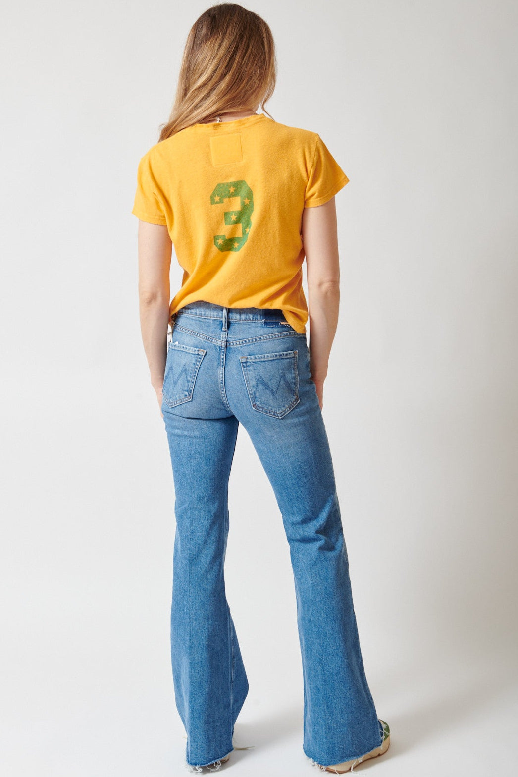 Mari wearing Mother Denim The Doozy Fray rear view