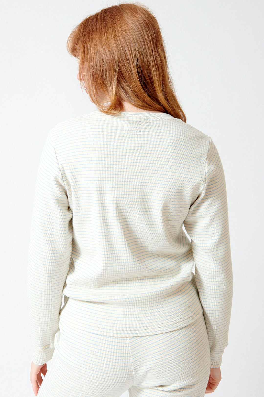 Waverly wearing Mother Denim The Long Sleeve Boxy Goodie Goodie rear view