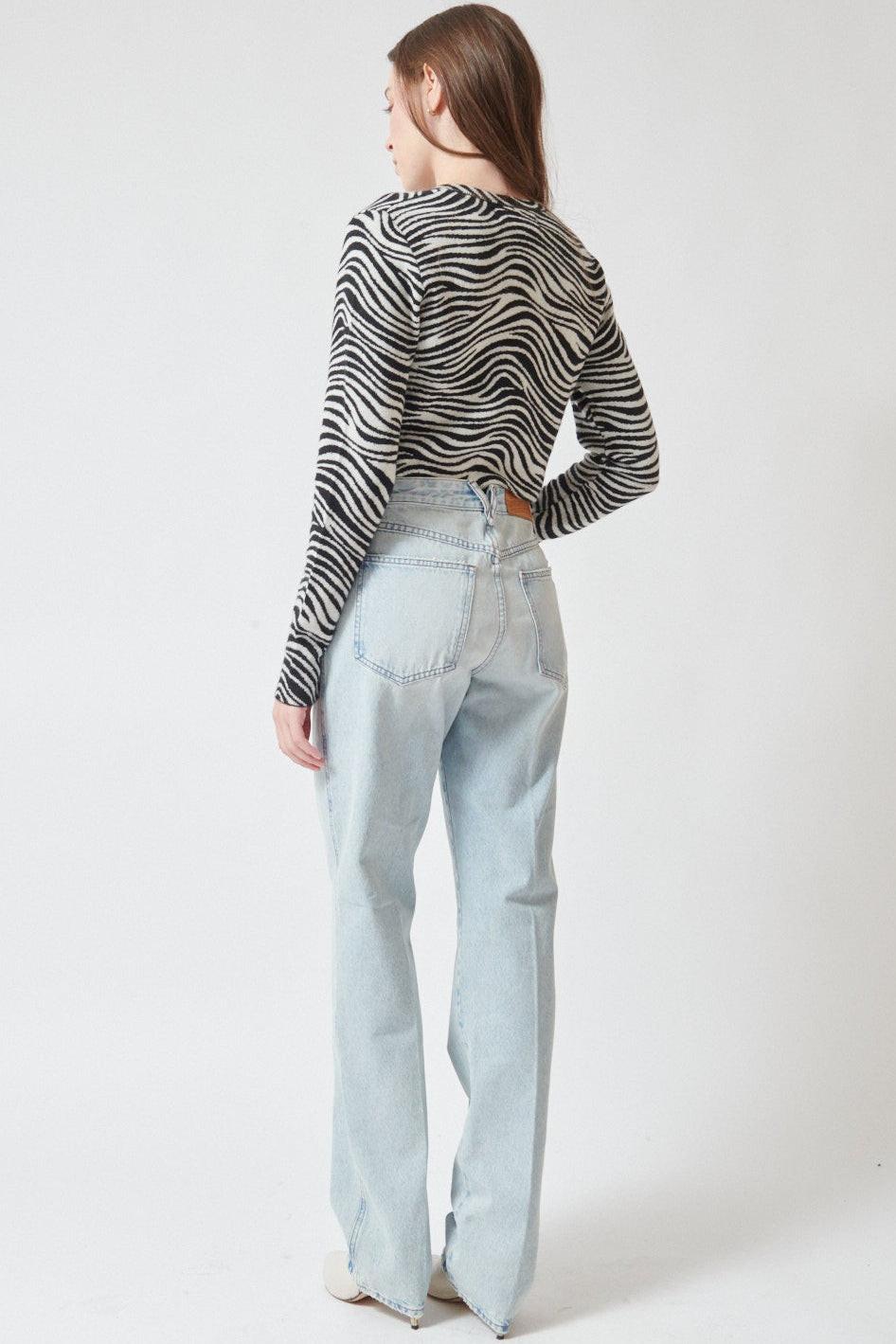 Angela wearing SPRWMN Slim Boyfriend Jean rear view