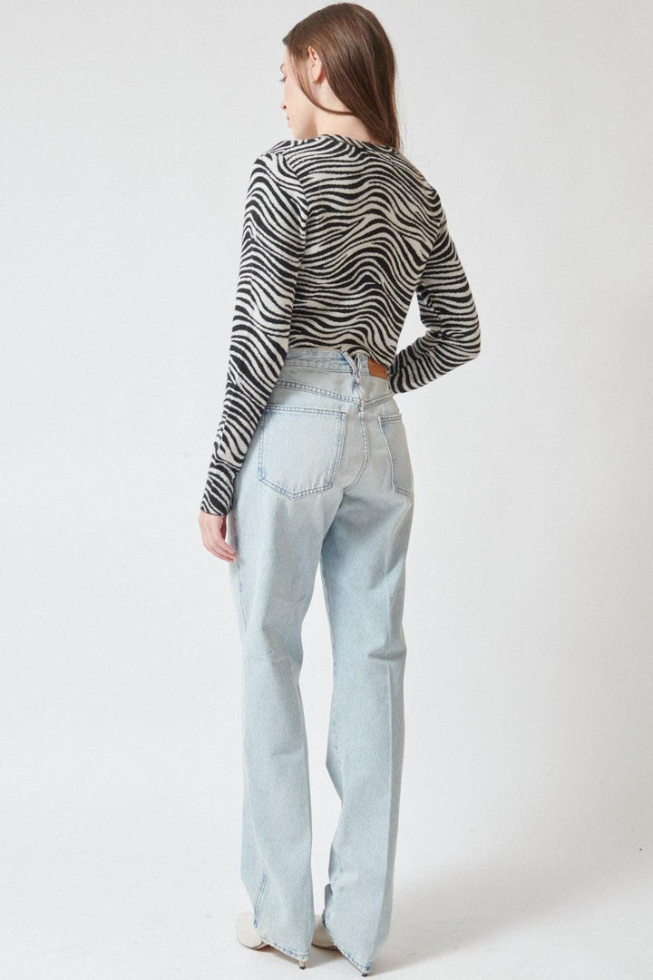 Angela wearing SPRWMN Slim Boyfriend Jean rear view