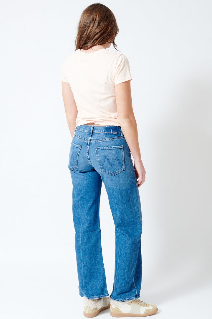 Julia wearing Mother Denim The Mid Rise Lasso Sneak rear view