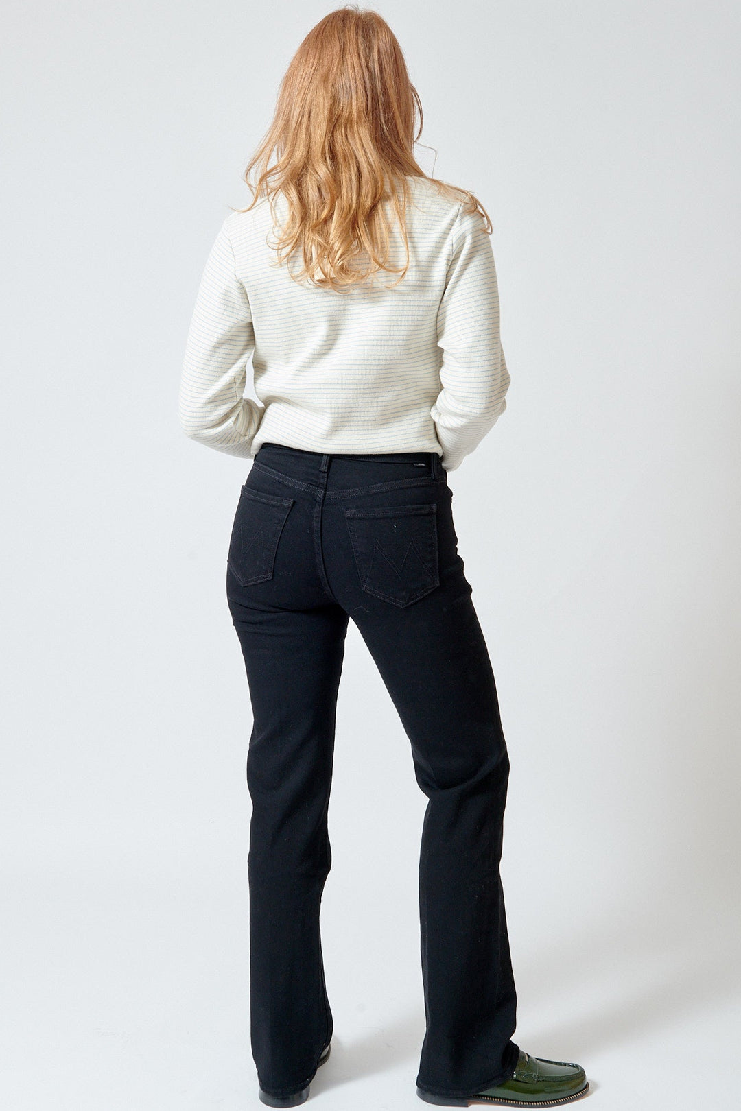 Waverly wearing Mother Denim The Kick It rear view