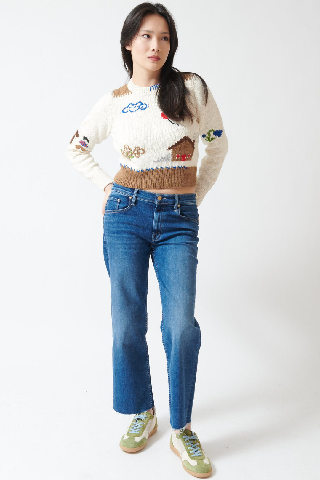 Lilly wearing Mother Denim The Newbie Ankle Fray front view