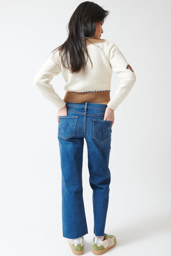 Lilly wearing Mother Denim The Newbie Ankle Fray rear view