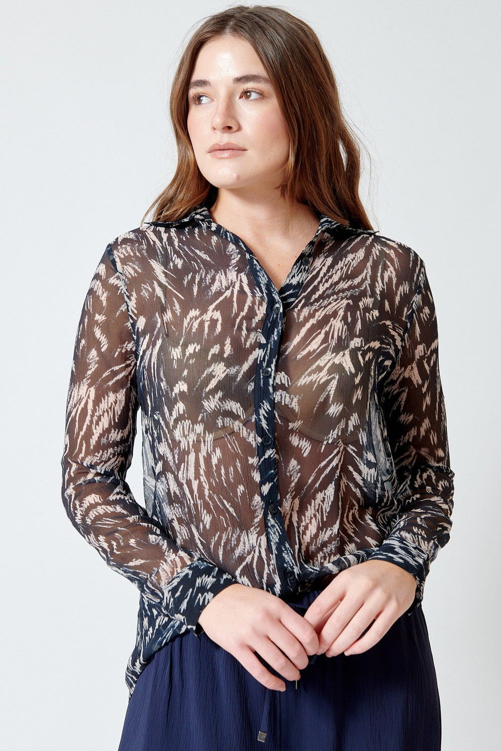 Julia wearing Apiece Apart Alva Button Up front view