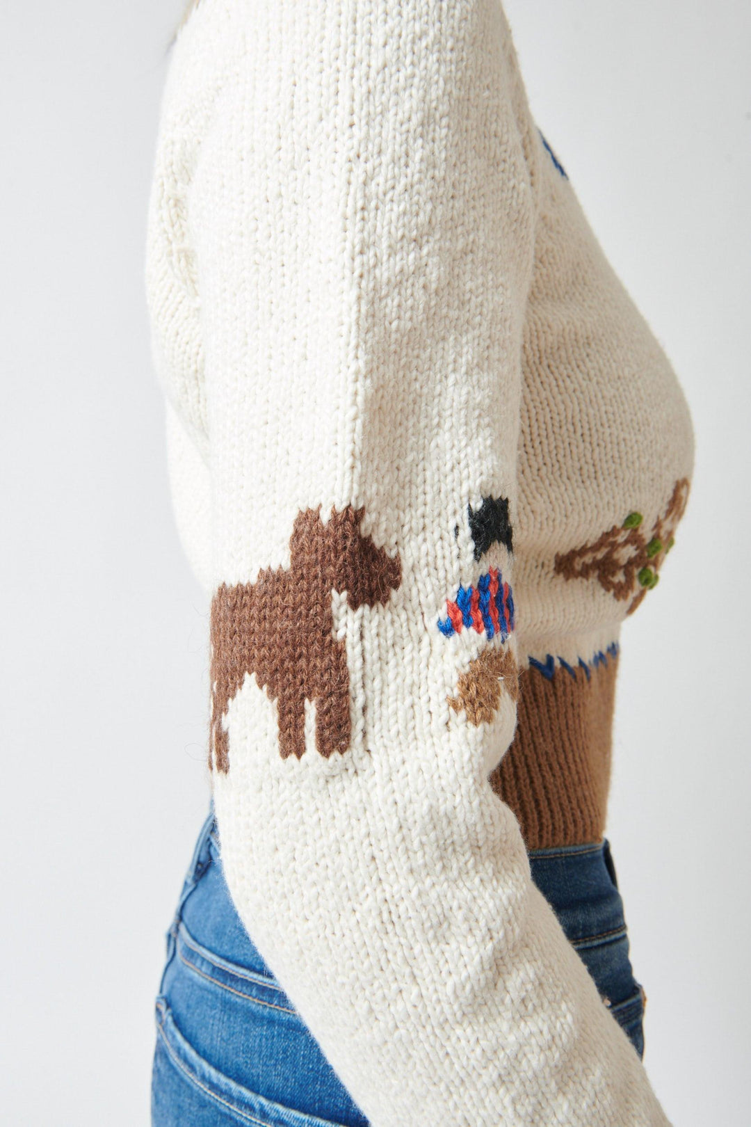Lilly wearing Mother Denim The Shrunken Pullover side/detail view