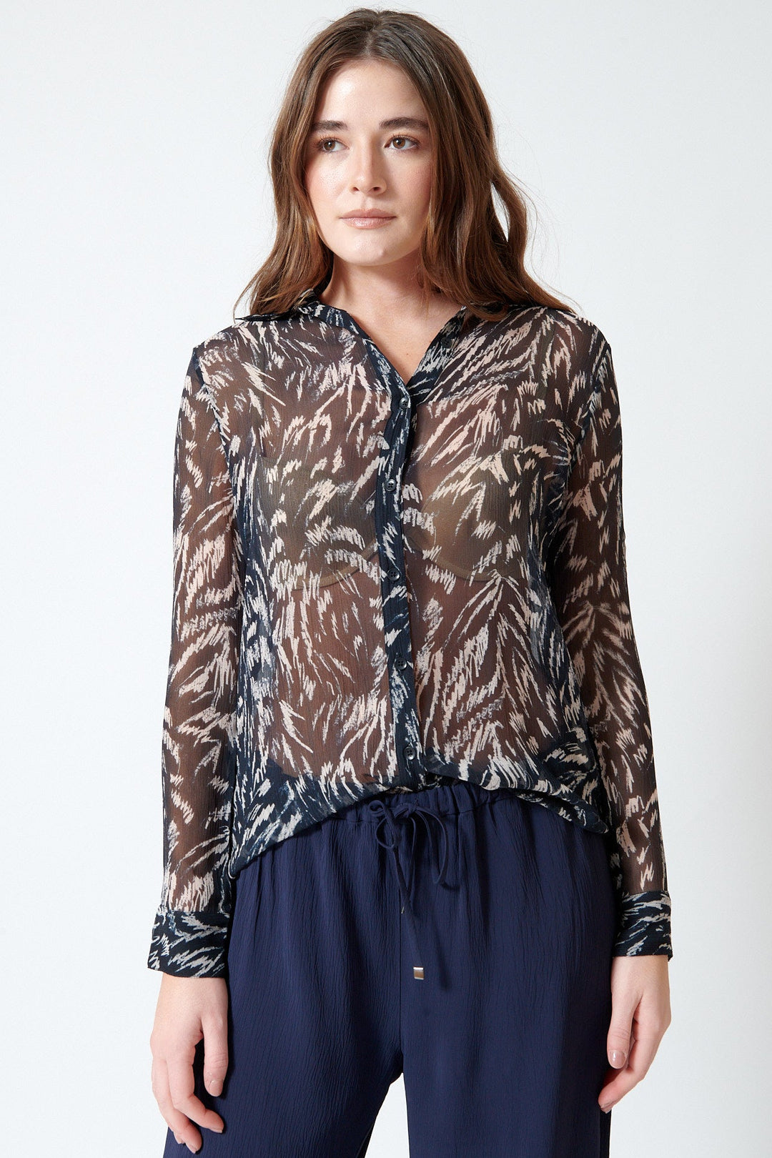 Julia wearing Apiece Apart Alva Button Up front view